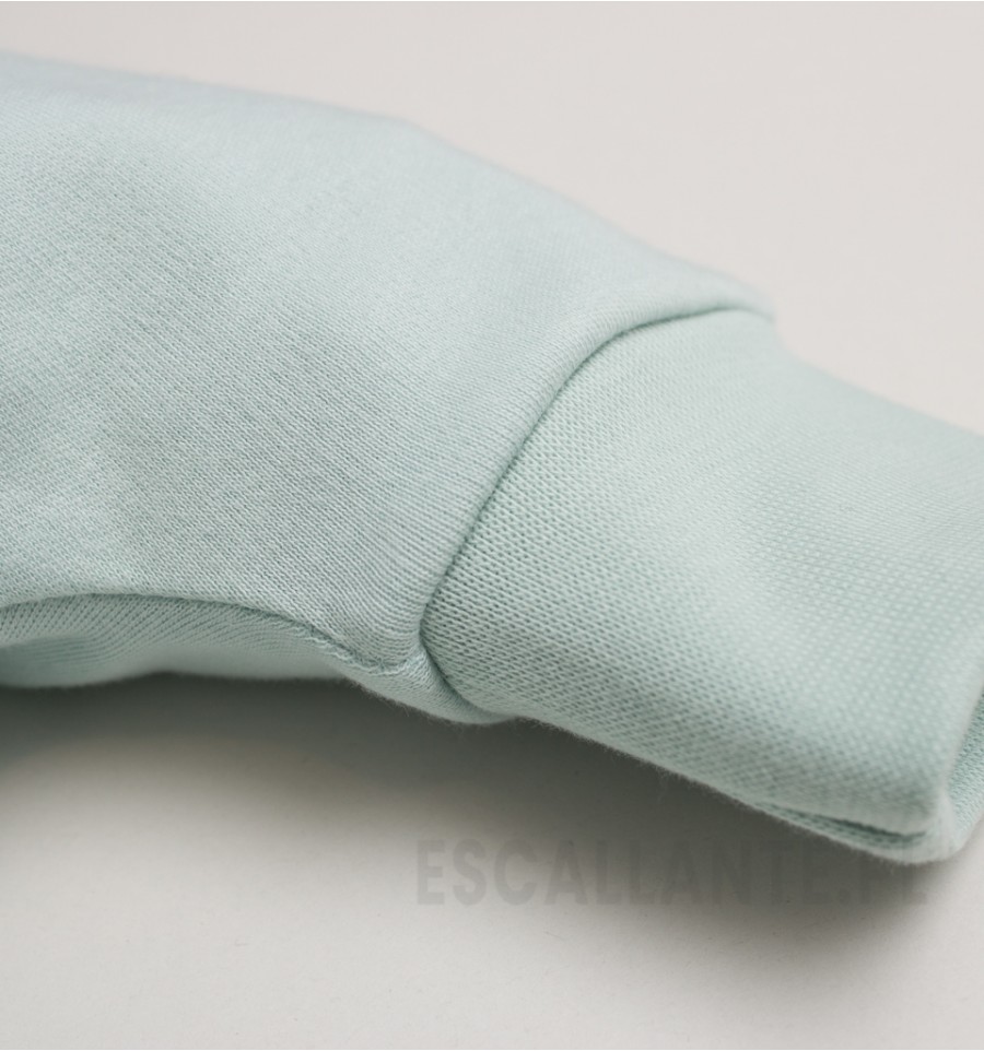 Miętowe spodnie niemowlęce WIOSENNE KWIATKI z bawełny organicznej dla dziewczynki